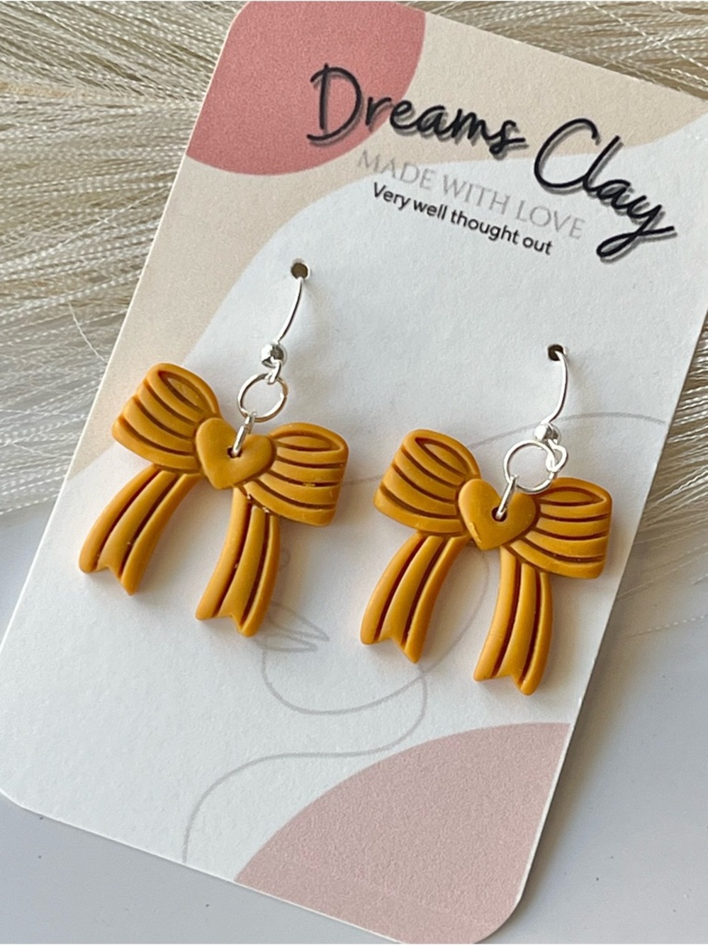 Dreams Clay Mustard Bow Heart Dangle Earrings